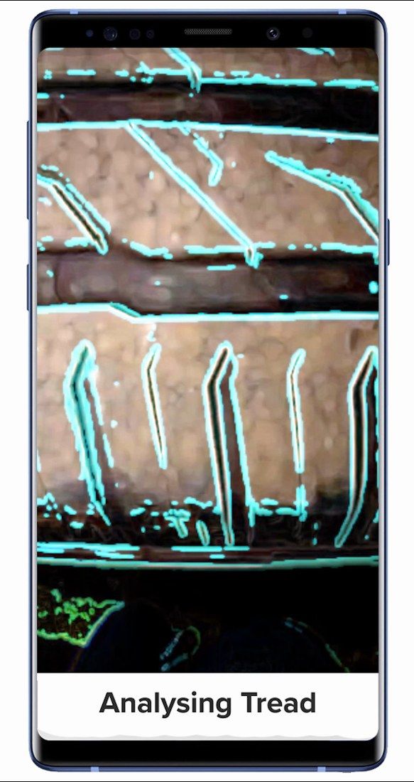 Anyline / TireBuddy, stage 6: Full-screen camera view of tyre tread with cyan edge-detection outlines and faint text 'An