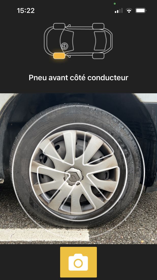 CaRool, stage 3: Another front-driver capture: full wheel with circular ring guide over the live view (App 